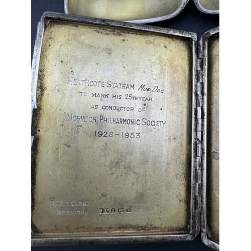 800 - Silver: A cigarette case, Birmingham 1945, with presentation inscription to Heathcote Statham, condu... 