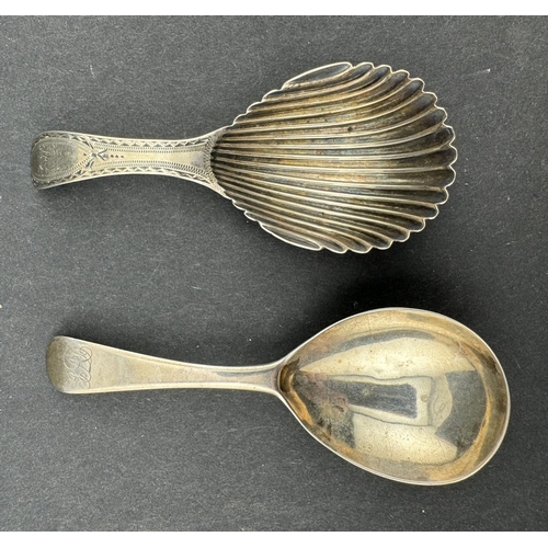 828 - Silver: An Old English pattern caddy spoon, London 1811, together with a shell pattern caddy spoon, ... 