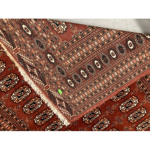 90 - Carpets/Rugs: Telke Bokhara red ground with 3 rows of 51 oval motifs widespread with geometric shape... 