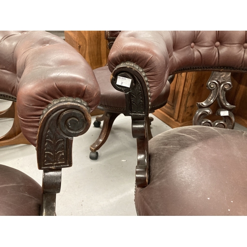 98 - Furniture: A group of three office chairs in mahogany, with button-upholstered faux leather seats on... 