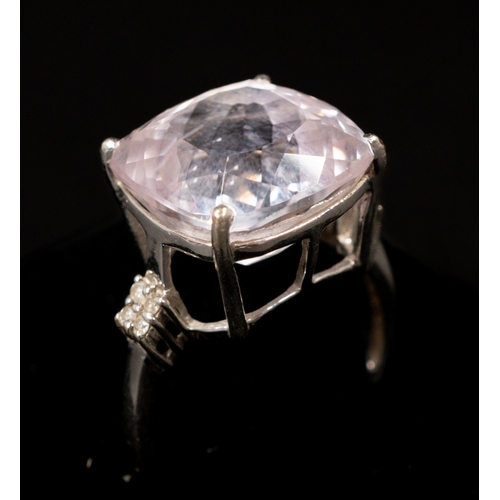 447 - Jewellery: Jewellery: 9ct white gold ring set with a 12.5mm square-cut kunzite with four diamonds on... 