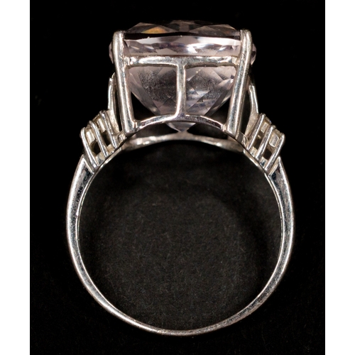 447 - Jewellery: Jewellery: 9ct white gold ring set with a 12.5mm square-cut kunzite with four diamonds on... 