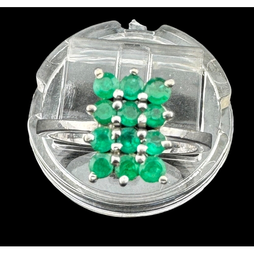 463 - Jewellery: Jewellery: 18ct white gold rectangular cluster ring set with twelve circular cut emeralds... 