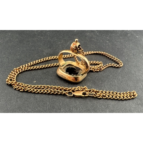 473 - Jewellery: a gold cased fob seal with unengraved onyx table, 6.6g, togther with a 47cm 9ct gold curb... 