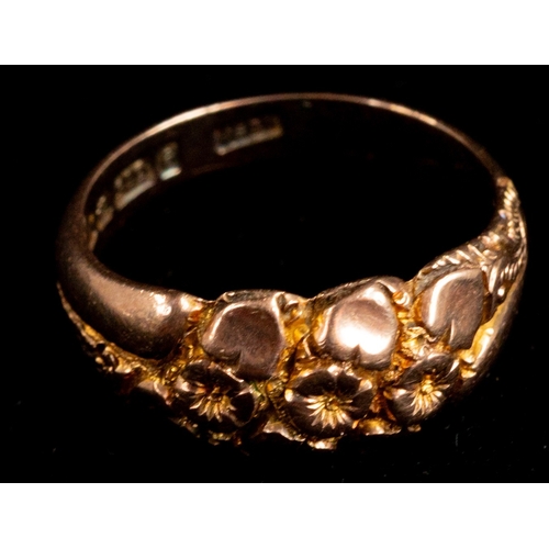 479 - Jewellery: Jewellery: 9ct gold ring with a floral head, 8.7mm wide tapering to 3.5mm, ring size O½, ... 