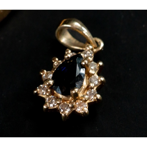529 - Jewellery: a 9ct gold bangle, set with four sapphires and three diamonds, a 9ct gold necklace and a ... 