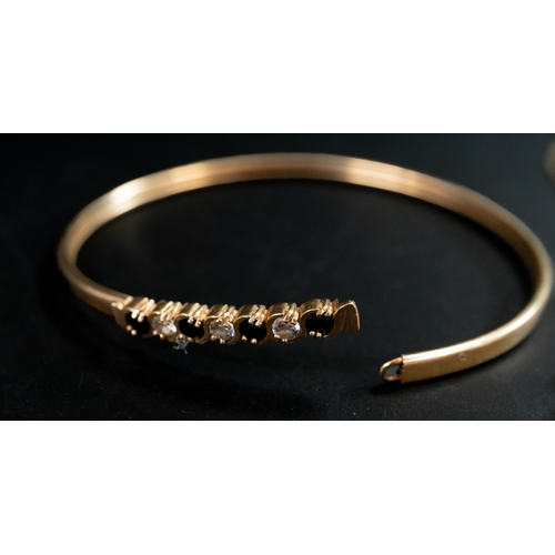 529 - Jewellery: a 9ct gold bangle, set with four sapphires and three diamonds, a 9ct gold necklace and a ... 