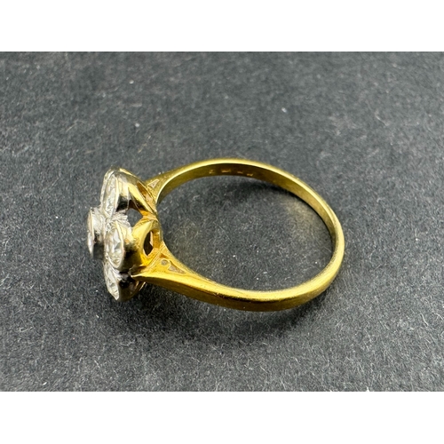 540 - Jewellery: Jewellery: 18ct gold floral cluster ring, rub over set with seven brilliant-cut diamonds,... 