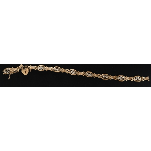 551 - Jewellery: a 9ct gold open fancy link two colour bracelet with heart shaped clasp, broken. 20.5cm, 8... 