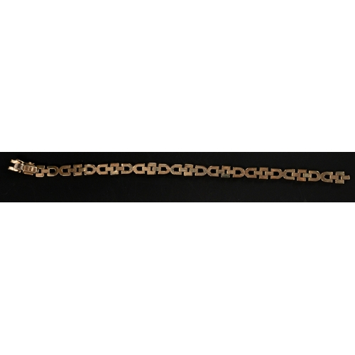 556 - Jewellery: Jewellery: 9ct gold bracelet with stirrup style links, width 6mm, length 19.5cm, with a b... 