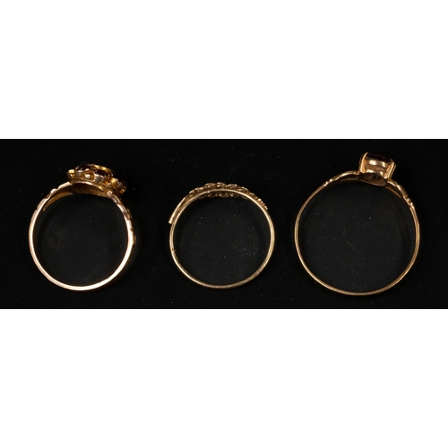 558 - Jewellery: a 9ct gold and garnet cluster ring, UK size O; a 9ct gold and amethyst solitaire ring, UK... 