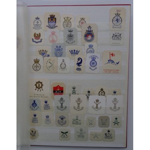 103 - A stockbook of cut out Crests from late Nineteenth and early Twentieth Century (hundreds)