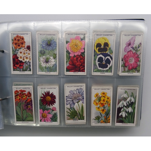 117 - A collection of Trade and Cigarette cards collected on a Horticultural theme, including many complet... 