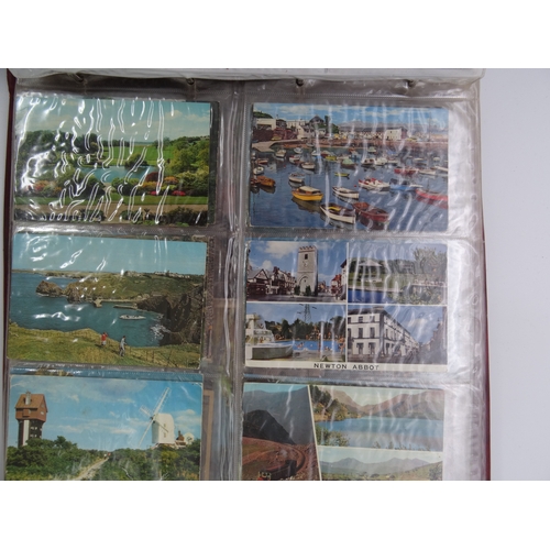 121 - A large album with 120+ postcards, mainly Europe, many RPs