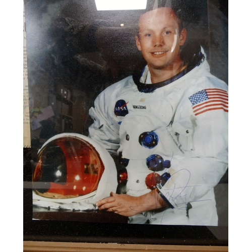 73 - A large framed Wisconsin Journal front page from the day of the moon landing, with an inset photo of... 