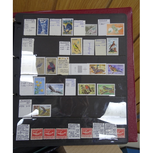 89 - A four volume collection on Birds, predominately mint, collected mainly by sets. Noted Bahrain 1966 ... 