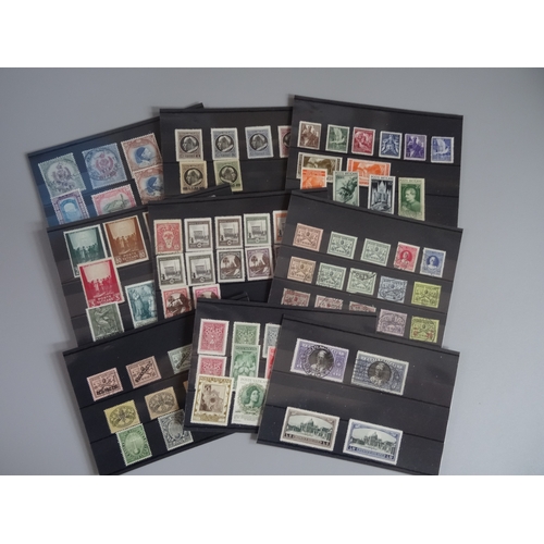 34 - Small all world selection on cards etc including Albania 1919 overprint issues used on small pieces,... 