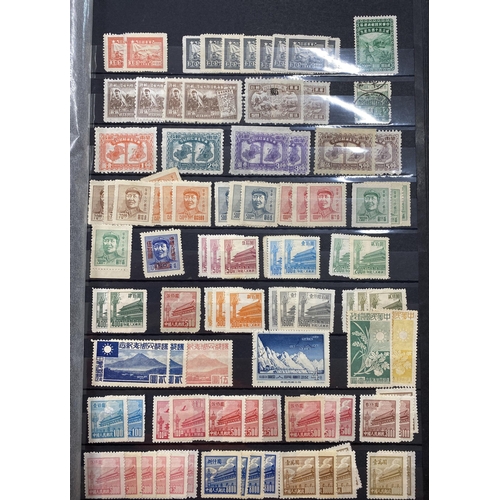 153 - A collection of mint and used mid-period Asian stamps, including China, Vietnam, Japan and Mongolia,... 