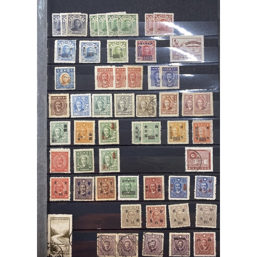 153 - A collection of mint and used mid-period Asian stamps, including China, Vietnam, Japan and Mongolia,... 