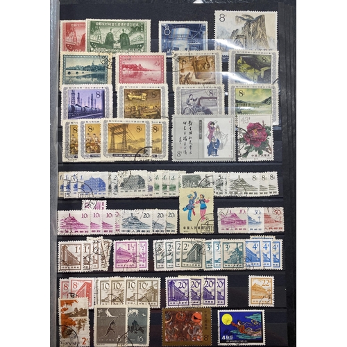 153 - A collection of mint and used mid-period Asian stamps, including China, Vietnam, Japan and Mongolia,... 