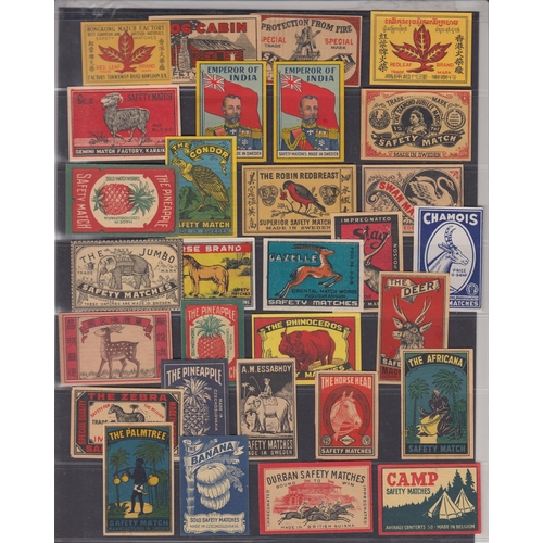 323 - An album page of illustrated matchbox labels, various companies including Redleaf, Wimco and Durban