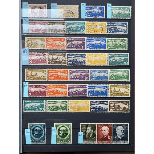 414 - A collection in 2 stock books mainly mint, including blocks of inflation issues, Occupation issues, ... 