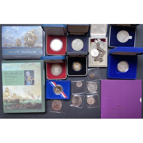 38 - An accumulation of Twentieth Century World coins, including 7 boxed silver Crowns, noted 1969 Prince... 