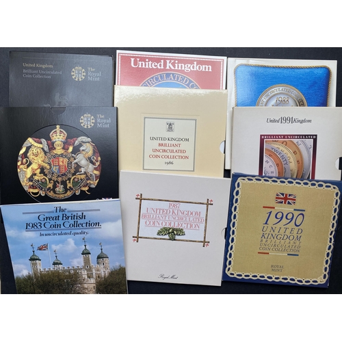 77 - A collection of UK Brilliant Uncirculated Year Coin Sets in R.M. presentation folders from 1983 to 2... 