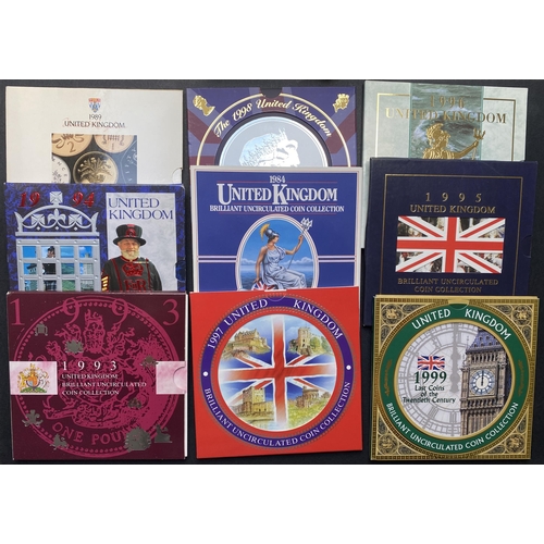 77 - A collection of UK Brilliant Uncirculated Year Coin Sets in R.M. presentation folders from 1983 to 2... 