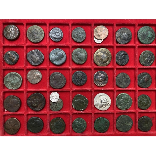 93 - A collection of Roman bronze and silver coins, in three trays from the First Century onwards, condit... 