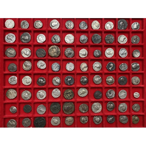 93 - A collection of Roman bronze and silver coins, in three trays from the First Century onwards, condit... 