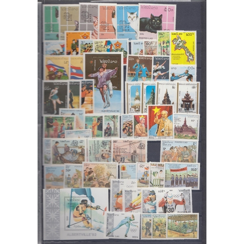 832 - An u/m collection in stock book with a couple of earlier sets noted 1957 Elephants, then 60 or so se... 