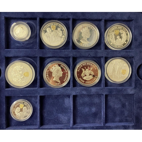 108 - An accumulation of coin covers produced by Mercury and Golden Wedding silver proof Crown size coins ... 