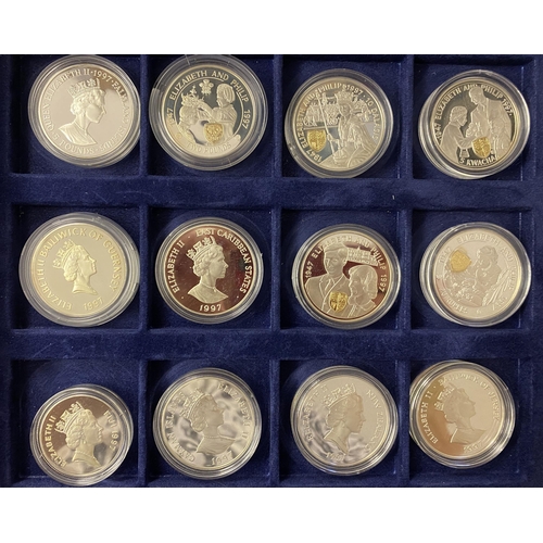 108 - An accumulation of coin covers produced by Mercury and Golden Wedding silver proof Crown size coins ... 