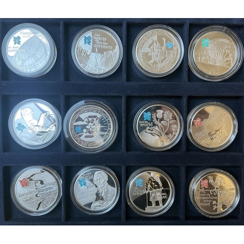 59 - A collection of 21 UK QEII silver £5 coins, including Countdown to London 2012 & A Celebration of Br... 