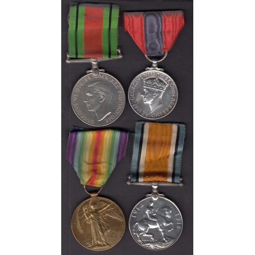 189 - A group of four UK medals, WWI British War Medal, Victory Medal, WWII Defence Medal and KGVI Imperia... 