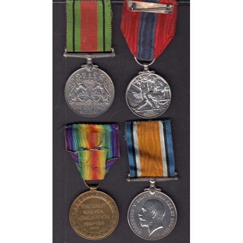 189 - A group of four UK medals, WWI British War Medal, Victory Medal, WWII Defence Medal and KGVI Imperia... 