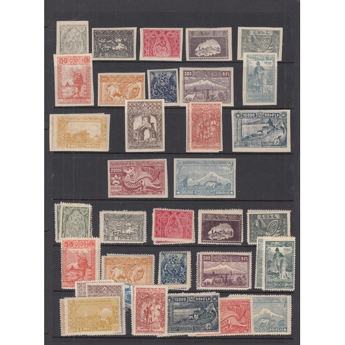 324 - A mint and used World stamp accumulation in albums and loose, including Puerto Rico, earlier Russia ... 