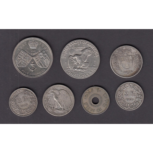 103 - An accumulation of mainly 20th Century circulated coins, including some silver coins noted Swiss 2Fr... 