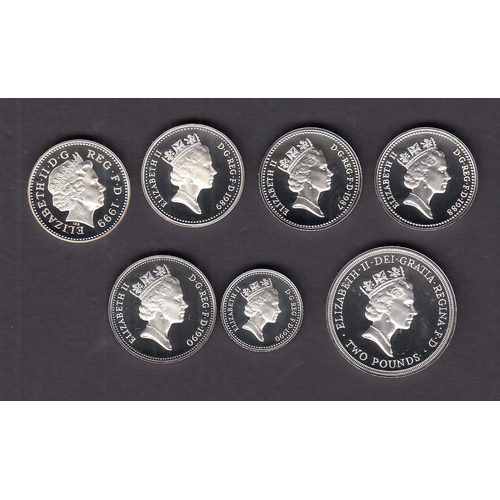 66 - A collection of UK QEII boxed silver proofs, including x18 silver proof £1 coins from 1983 to 2000 a... 