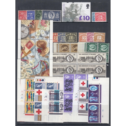 319 - A collection of GB QEII issues from the 1950s to 2000, including mint sets, FDCs, presentation packs... 