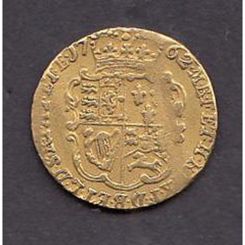 61 - UK 1762 KGIII gold ¼ Guinea, noted central crease, but clear obverse and reverse