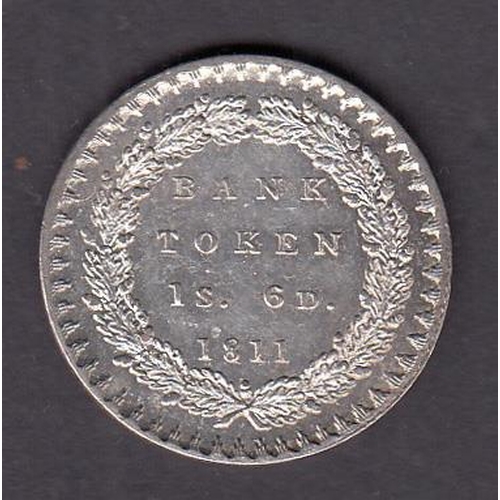 64 - Ireland 1811 silver 1/- & 6d silver Bank Token, in good condition