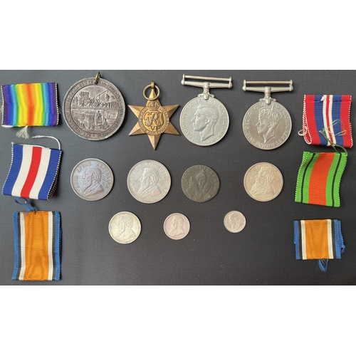 56 - A group of x5 UK WWII medals and coins, including x2 Defence Medals, France and Germany Star and x2 ... 