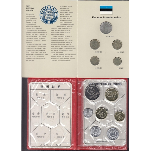 55 - A small World coin collection in an album and loose, mainly 20th Century circulated coins, strength ... 