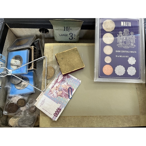 55 - A small World coin collection in an album and loose, mainly 20th Century circulated coins, strength ... 