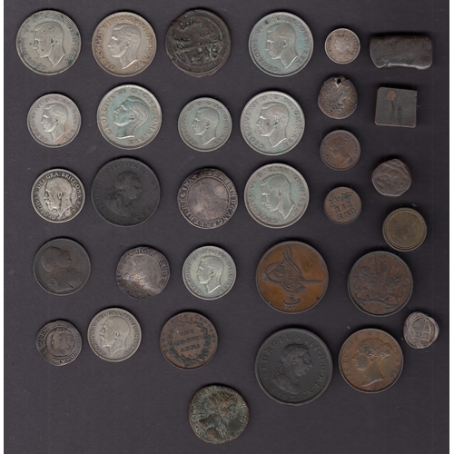 51 - A World coin collection in an album, including UK 20th Century circulated coins, odd worn hammered c... 