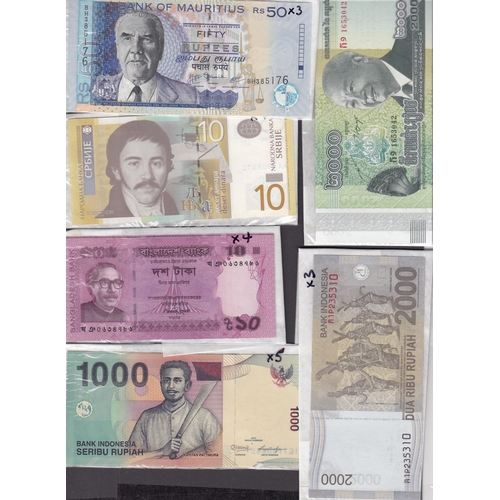 97 - A collection of 56 mint uncirculated banknotes from 11 Countries including India, Indonesia, Mauriti... 