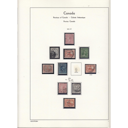 325 - A comprehensive mint & used collection of Canadian stamps housed in 2x illustrated Lighthouse volume... 