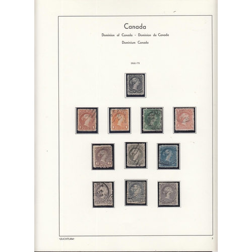 325 - A comprehensive mint & used collection of Canadian stamps housed in 2x illustrated Lighthouse volume... 
